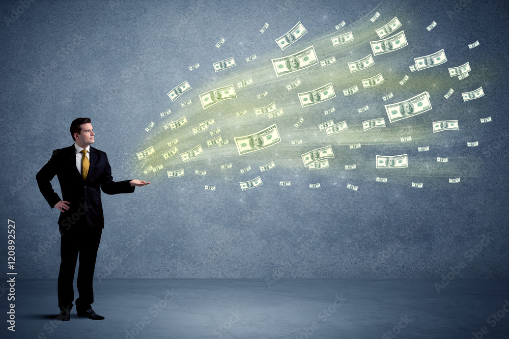 Obraz premium Man holding money