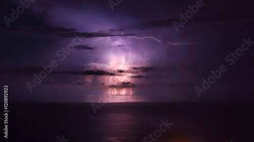 Purple lightning over the sea