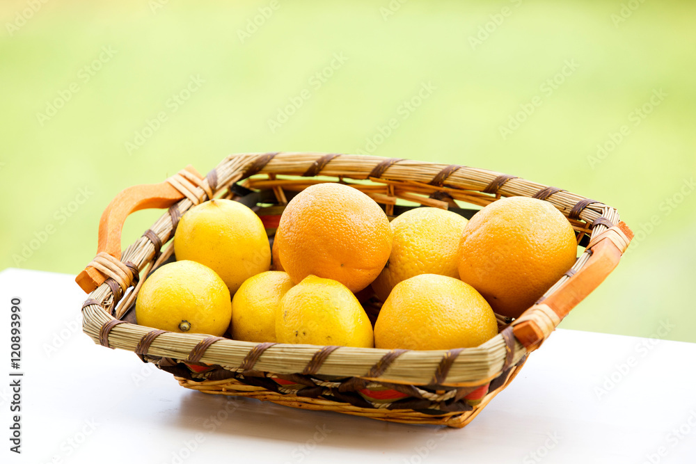 citrus basket, lemons and orange 