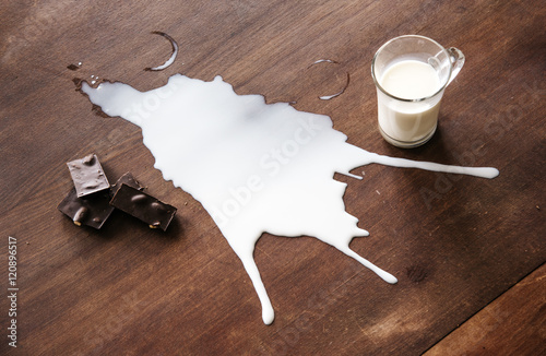 Chocolate and spilled milk on the table.