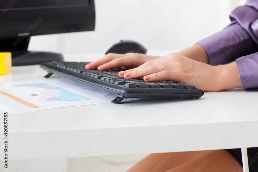 woman hands typing on keyboard woman hands typing on keyboard
