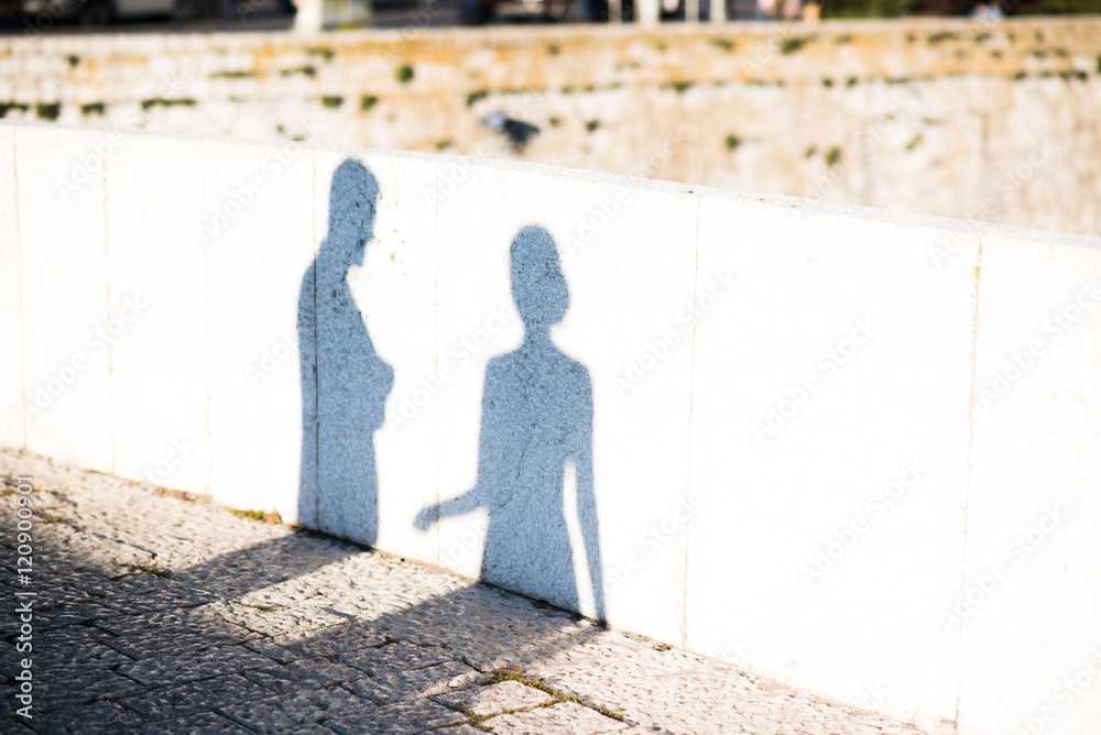 female and male shadows 