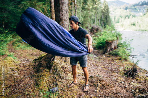 Man with sleeping bag 