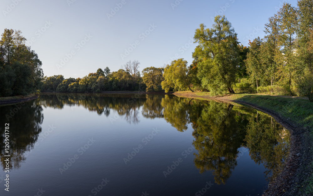Autumn forest reflection in water. Evening in Lermontov's estate, Russia.
Autumn forest reflection in water. Evening in Lermontov's estate, Russia.