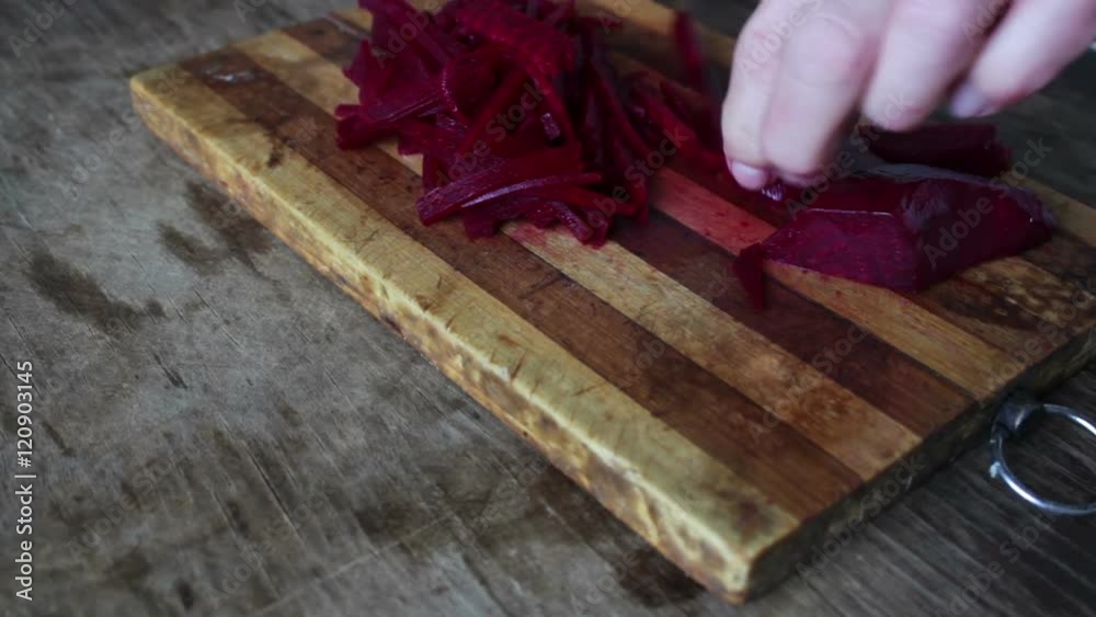 Cutting beet on a board chef cooking Cutting beet on a board chef cooking