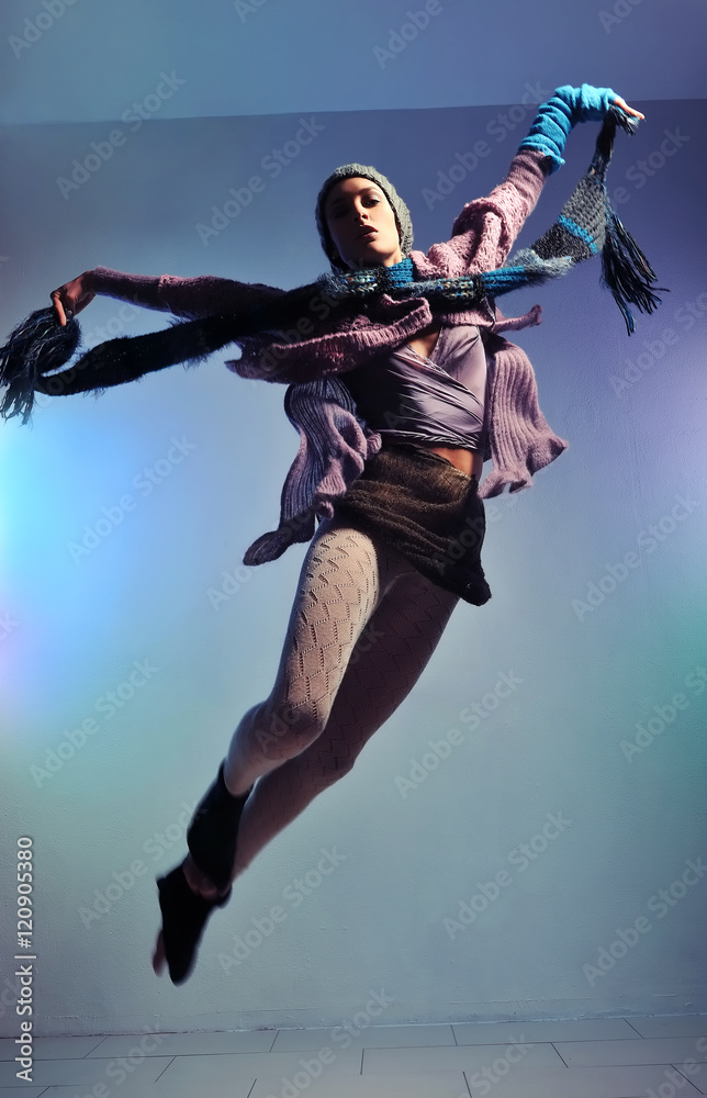 woman jump with colorful bacground - concept