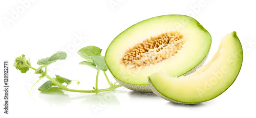 Green cantaloupe melon and leaves on isolated