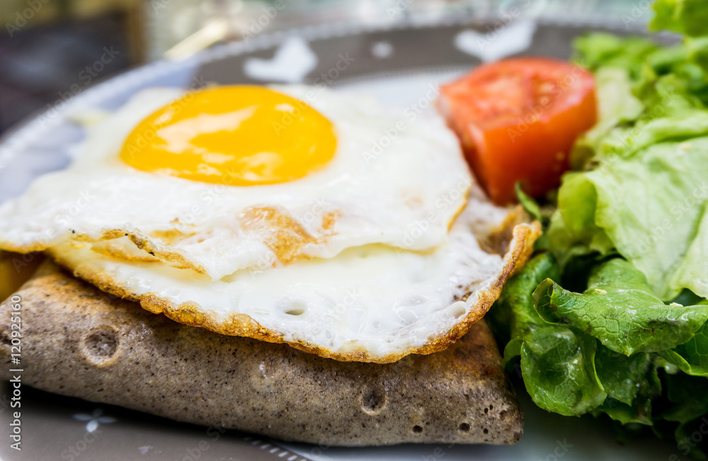 Homemade french buckwheat galette with egg Homemade french buckwheat galette with egg
