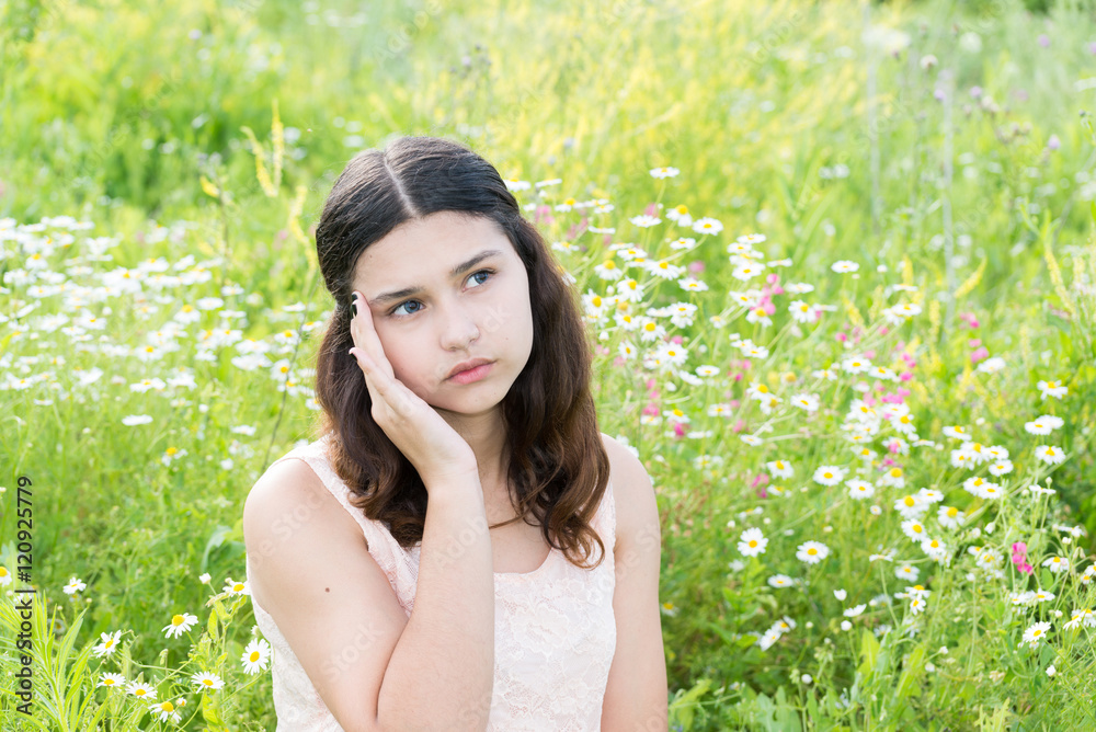 Teen girl thinks about the problems outside Teen girl thinks about the problems outside