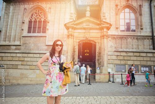 Beautiful girl during sightseeing old castle in Cracow, Wawel.