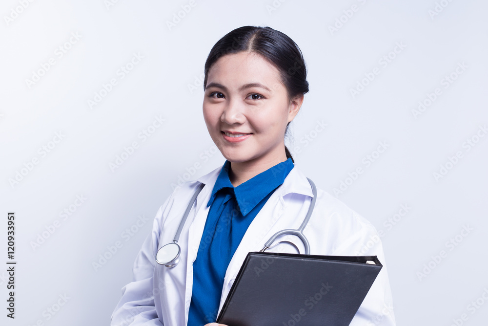 Female doctor holding a folder Female doctor holding a folder