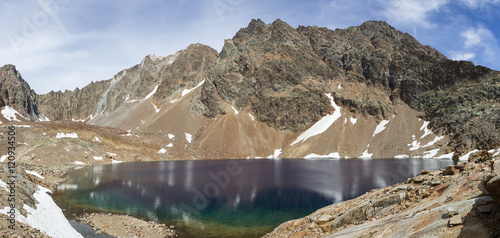 Alpine lake in Aosta valley, Italy. Panorama of Lac Mort, Valpelline
