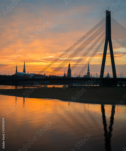 Autumnal silhouettes of old Riga city, Latvia. Old Riga city offers for touri...