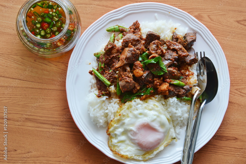 spicy stir fried chicken entrails curry and egg with fish chili sauce cup spicy stir fried chicken entrails curry and egg with fish chili sauce cup