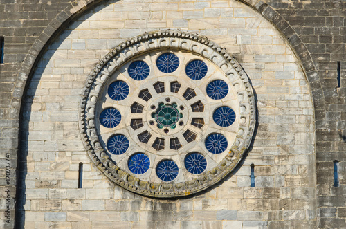 Rose window in portomarin Saint Nicholas church photo