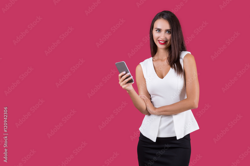 Smiling girl with her mobile phone Smiling girl with her mobile phone