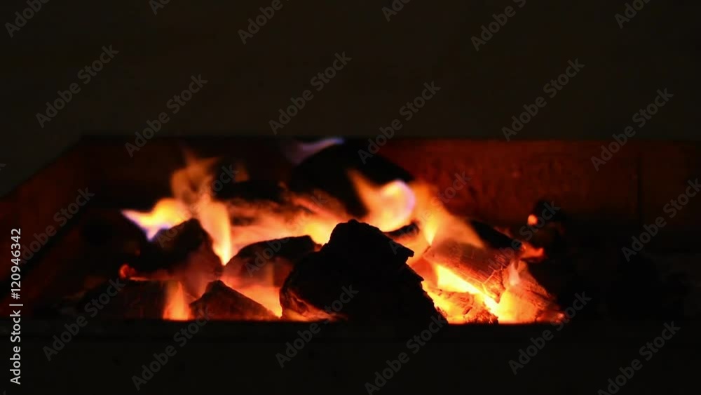 fire flames with sparks on a black background fire flames with sparks on a black background