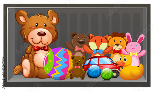 Many dolls and balls on the shelf