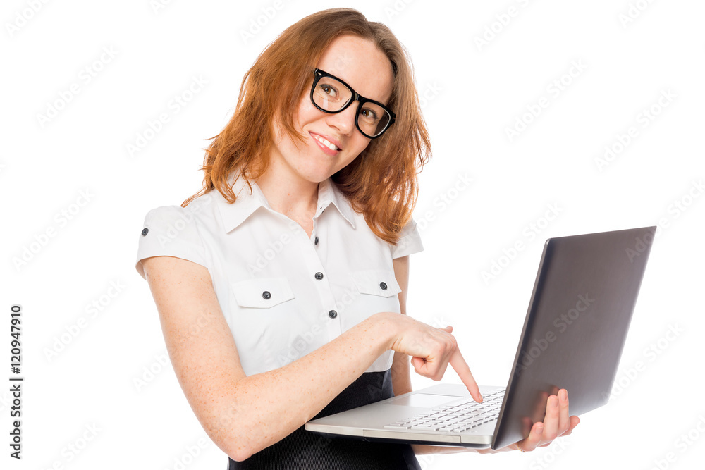 Happy businesswoman presses a button on the laptop isolated Happy businesswoman presses a button on the laptop isolated