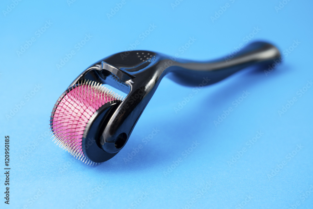 Naklejka premium Derma roller for medical micro needling therapy. Tool also known as: Derma roller, mesoroller, meso-roller, mesopen.