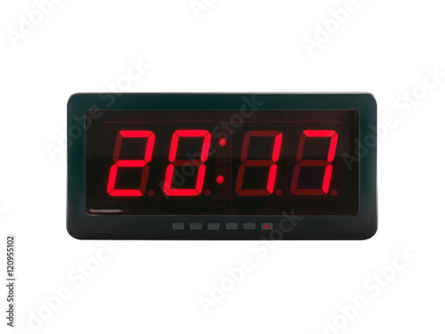 close up red led light illumination numbers 2017 on black digital electric alarm clock face isolated on white background, time symbol concept for celebrating the New Year