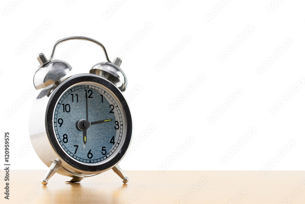 alarm clock on the table on white background. alarm clock on the table on white background.
