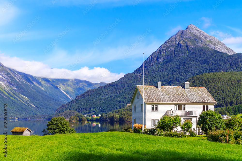 Typical country house in Beautiful Norway natural landscape