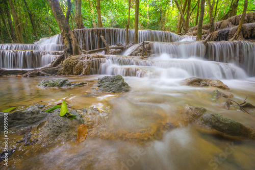Fototapeta Naklejka Na Ścianę i Meble -  Waterfall in deep rain forest jungle. (Huay Mae Kamin Waterfall