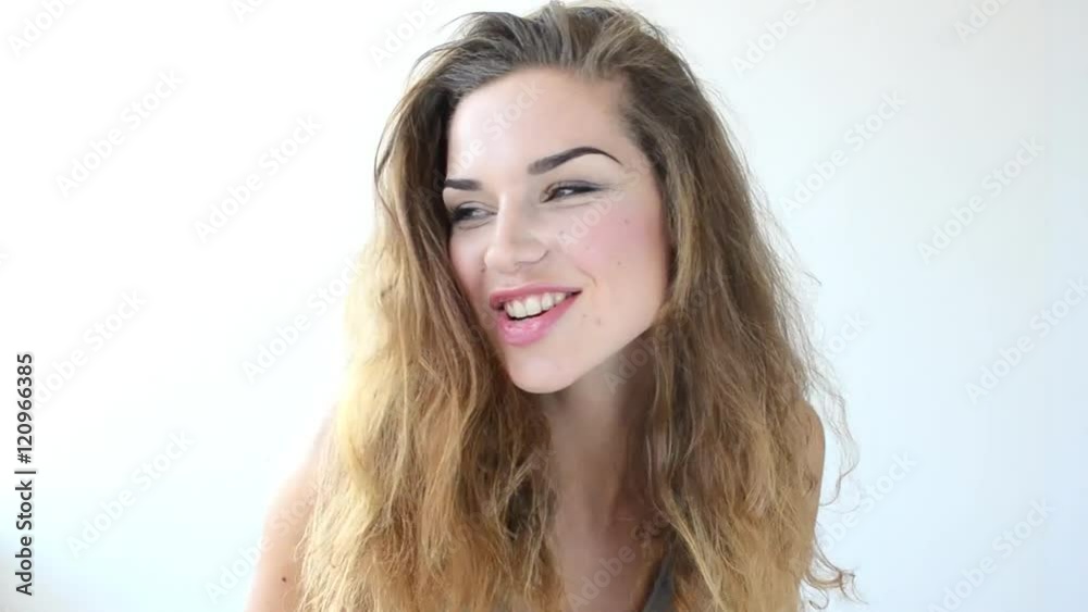 Beautiful woman videoportrait. She smile and posinf to the camera. Beautiful woman videoportrait. She smile and posinf to the camera.
