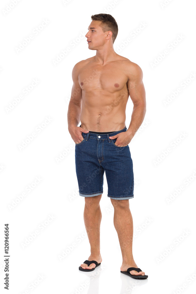 Handsome Man In Jeans Shorts And Sandals