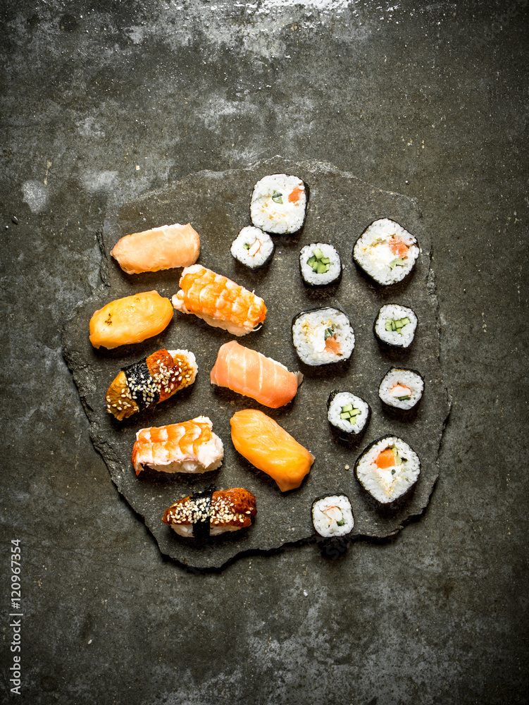 Sushi with tuna, shrimp, salmon and rolls. Sushi with tuna, shrimp, salmon and rolls.