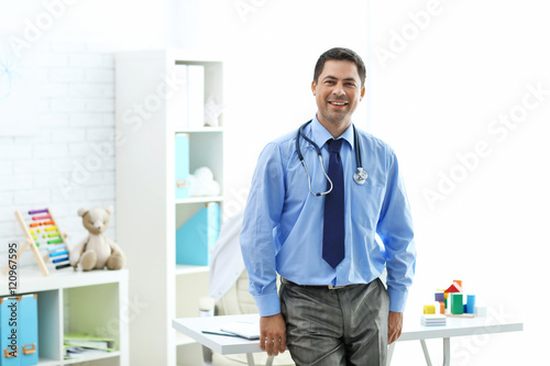 Pediatrician at his office