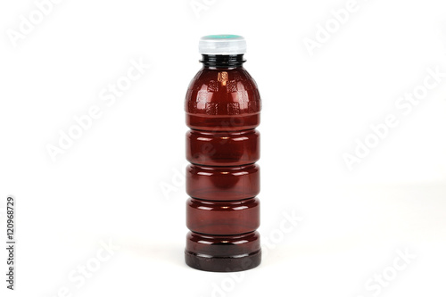dark brown plastic bottle isolated on white background