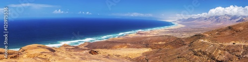 Cofete sandy beach with vulcanic mountains in the background, Jandia, Fuerteventura, second biggest Canary island, Spain. photo