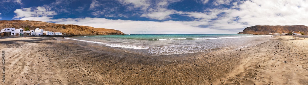Fishing village Pozo Negro with stone and sand beach, Fuerteventura, Canary Island, Spain. Fishing village Pozo Negro with stone and sand beach, Fuerteventura, Canary Island, Spain.
