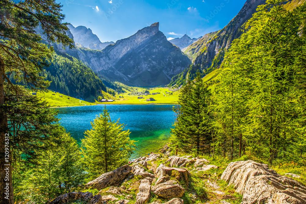 Fototapeta premium Tourquise clear Seealpsee with the Swiss Alps (mountain Santis) in the background, Appenzeller Land, Switzerland