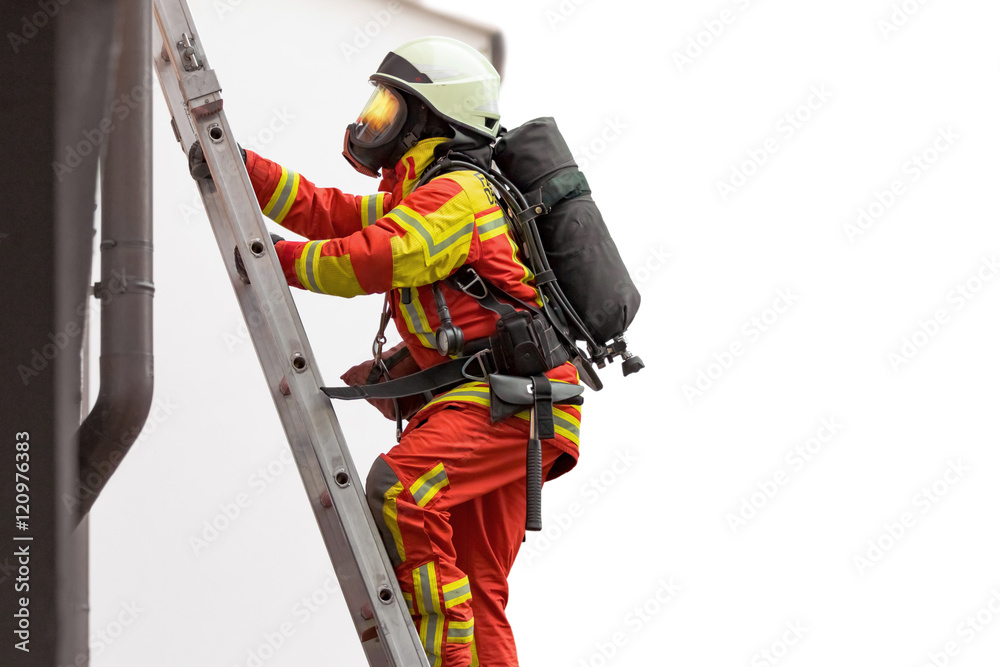 Fototapeta premium Fireman in action, climbing a stair