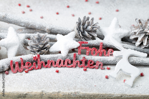 Photos Red letters with german Frohe Weihnachten means Merry Christmas.