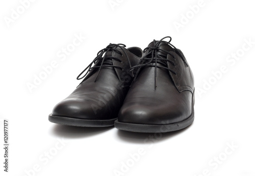 black men's shoes on a white background © Olga Kovalenko