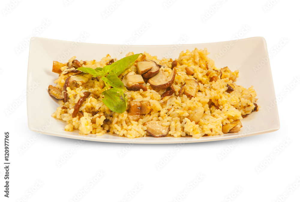 hot risotto with mushrooms on white plate on white background hot risotto with mushrooms on white plate on white background