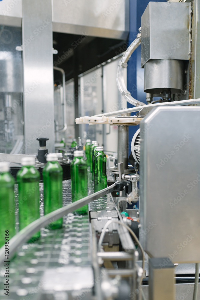 Water factory - Water bottling line for processing and bottling pure spring water into green glass small bottles. 
