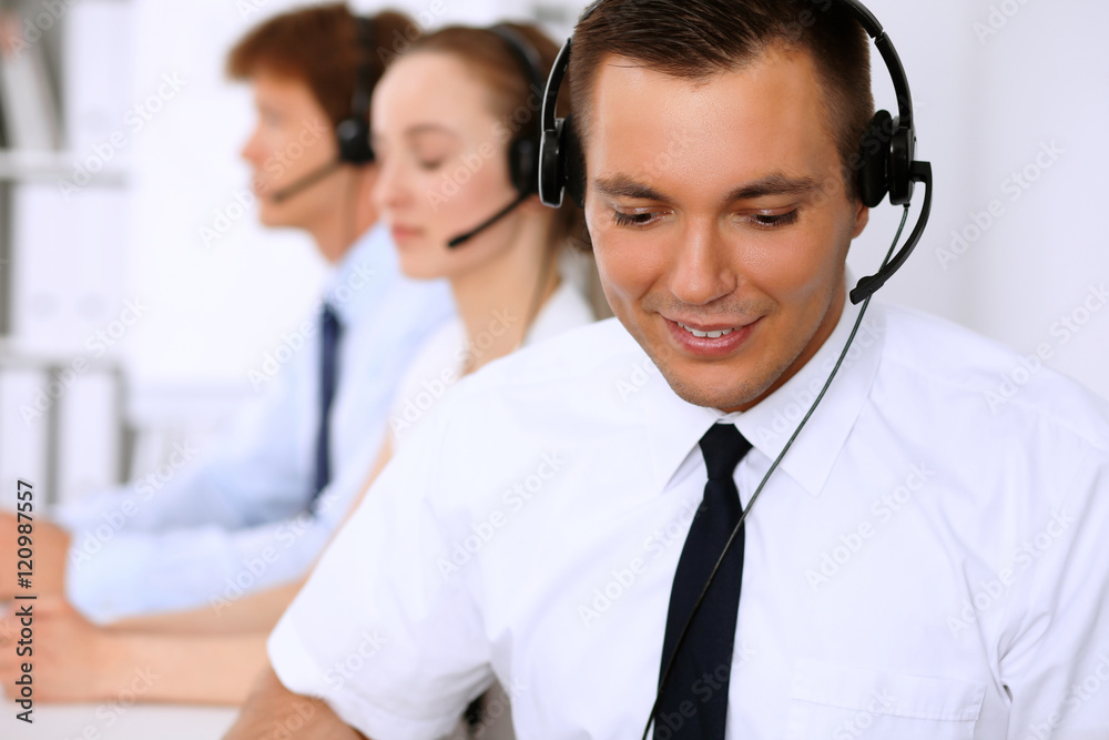 Young business man in headset. Call center Young business man in headset. Call center