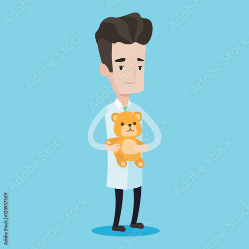 Pediatrician doctor holding teddy bear.