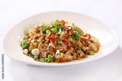 Minced pork with onion on white plate
