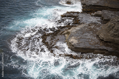 Waves crashing on Rocks