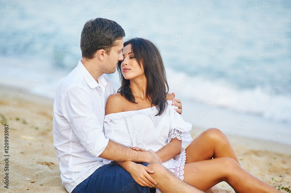 Beautiful romantic couple on the sea shore Beautiful romantic couple on the sea shore