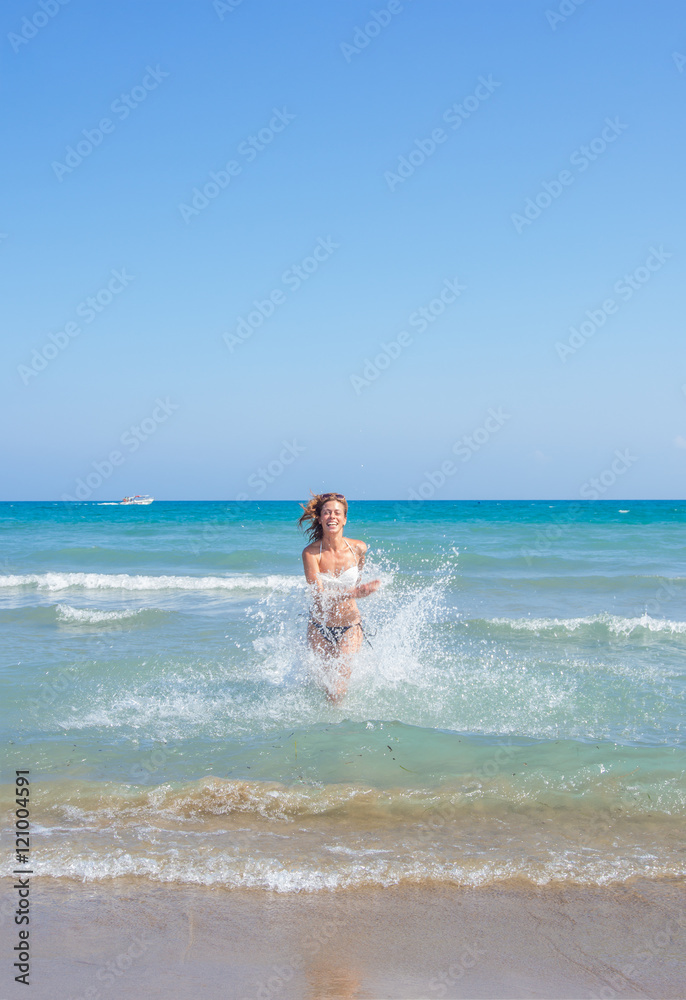 Woman in bikini enjoying the sea Woman in bikini enjoying the sea