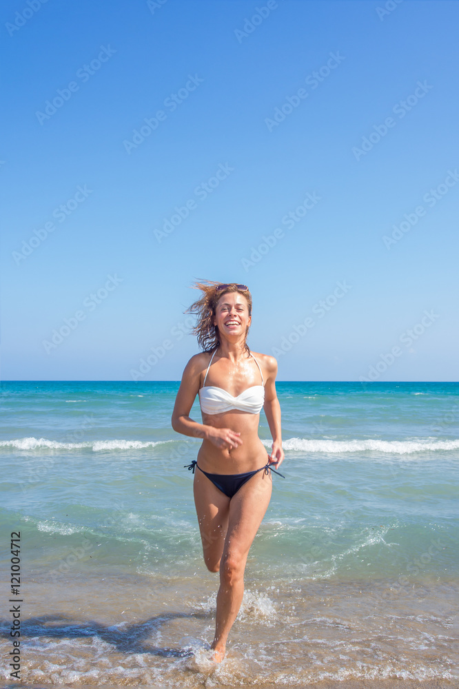 Woman in bikini enjoying the sea