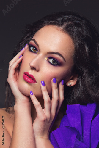 Brunette girl with purple make-up