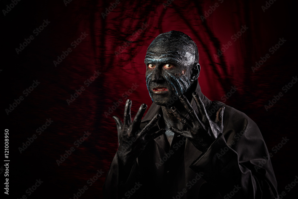 Studio portrait of a man in monster makeup Studio portrait of a man in monster makeup